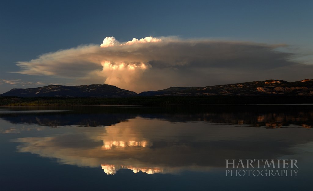Forest Fire reflects on  the "Marge of Lake Laberge"